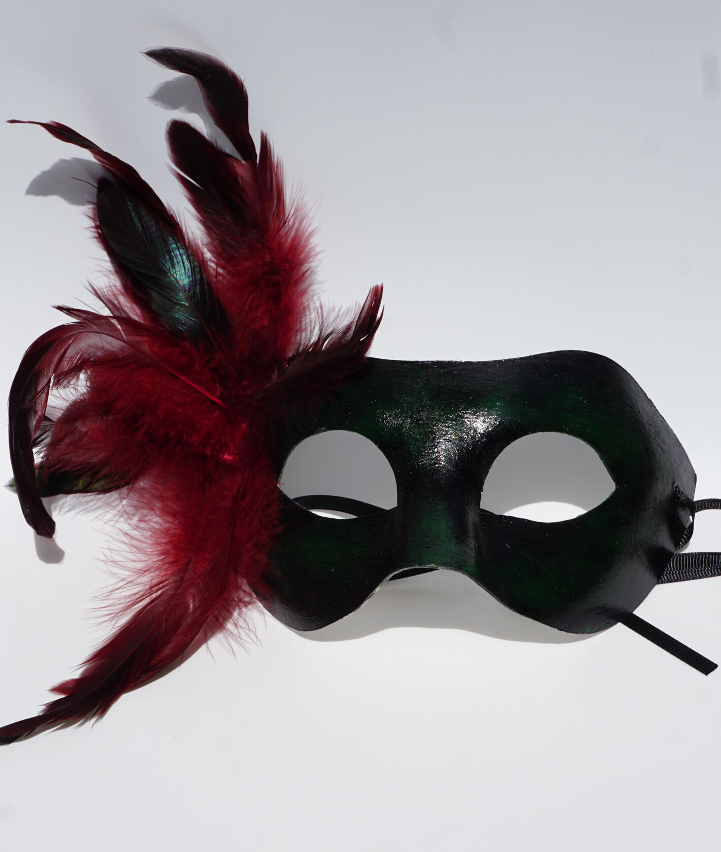 Feathered green and black Feathered green and black